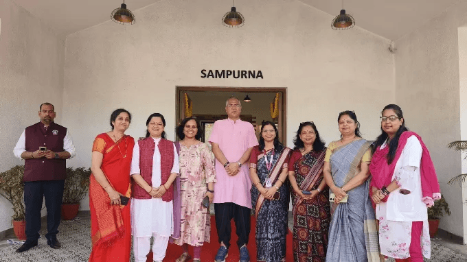 Group gathered outside the Sampurna entrance